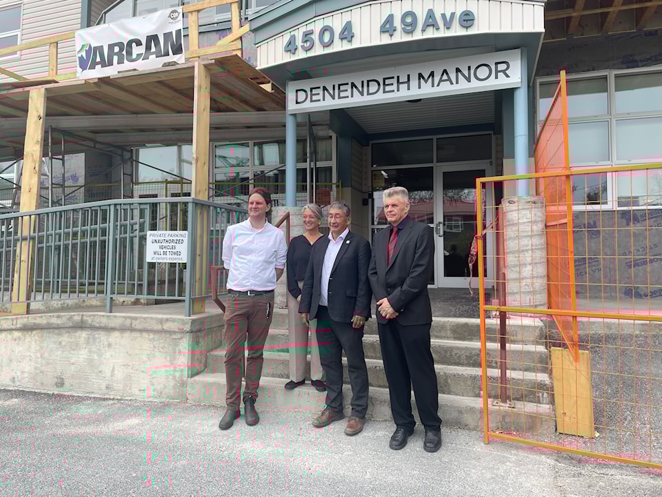 From left, Mayor Ben Hendriksen, federal Environment Minister Julie Dabrusin, CEO of Denendeh Investments Incorporated Darrell Beaulieu and GNWT Environment Minister Jay Mcdonald stand outside Denendeh Manor on 49 Avenue.Devon Tredinnick/NNSL photo